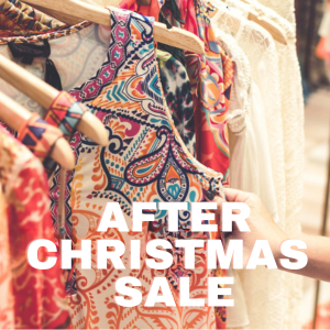 A lot of clothes hanging on rack for after Christmas Sale